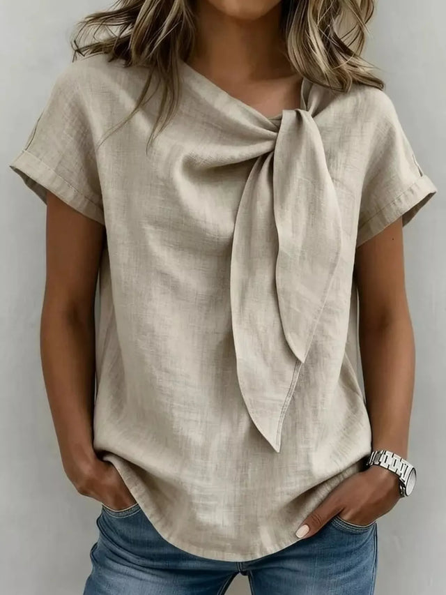 Full Size Bow Tie Neck Short Sleeve Blouse Plus Size - Draped in Grace